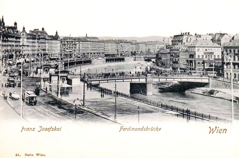 Blick über den franz Josefs Kai mit der Ferdinandbrücke stromaufwärts. Heute heißt die Brücke Schwedenbrücke